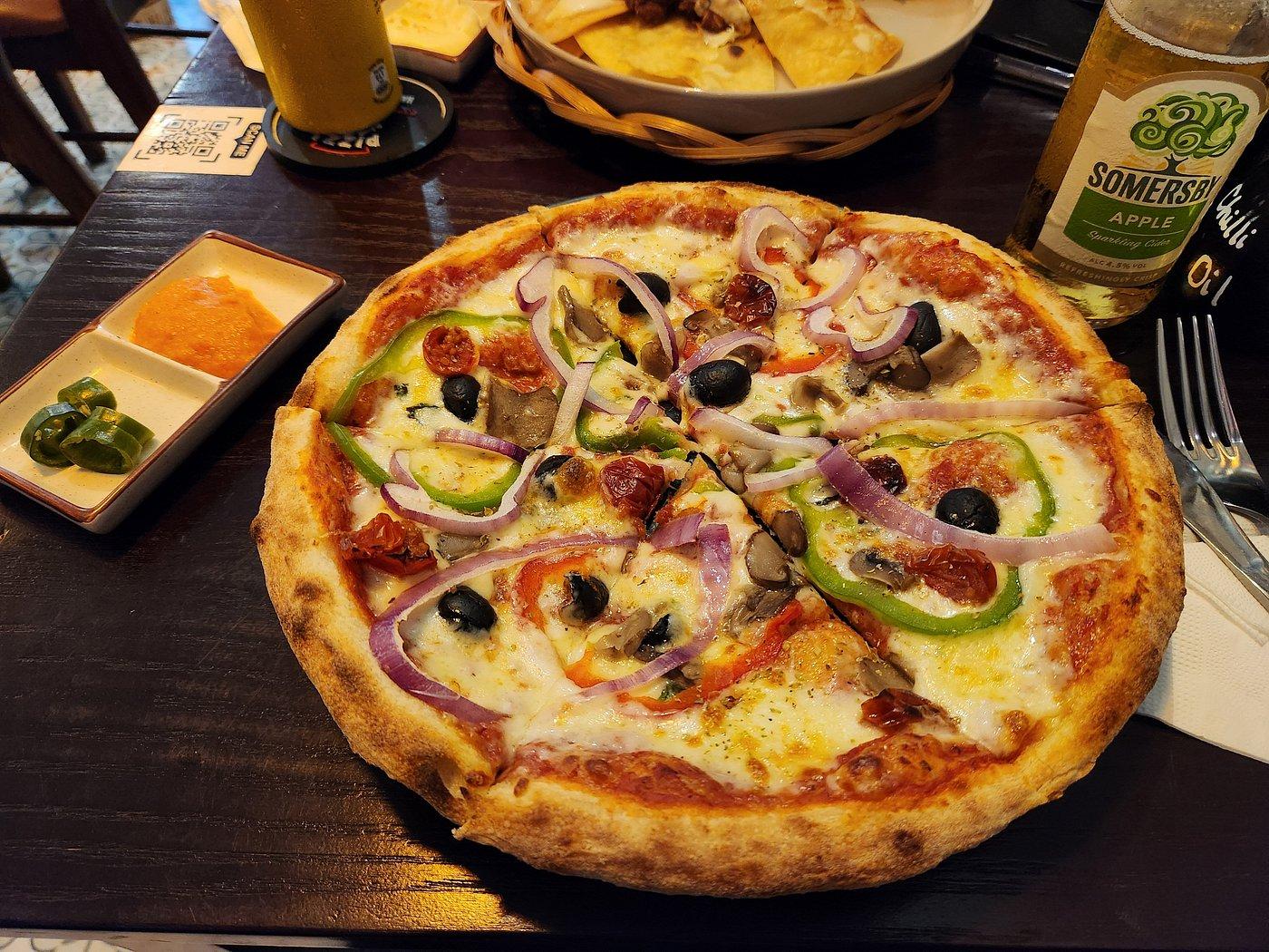 Pizza Lovers specializes in thin-crust Italian-style pizza made with fresh, imported ingredients 